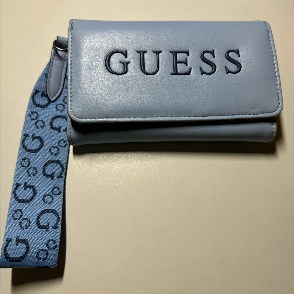 Blue GUESS wristlet wallet